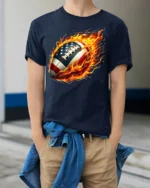Flaming USA Football Patriotic Game T-Shirt - model wearing navy shirt, hands in pockets