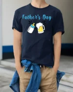 First Father’s Day Baby Bottle Beer Dad Shirt - model wearing navy shirt, hands in pockets