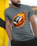 Flaming USA Football Patriotic Game T-Shirt - model in grey shirt leaning against column