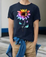 Be Kind Puzzle Sunflower T-Shirt Autism Awareness Graphic Tee for Kindness - model wearing navy shirt, hands in pockets