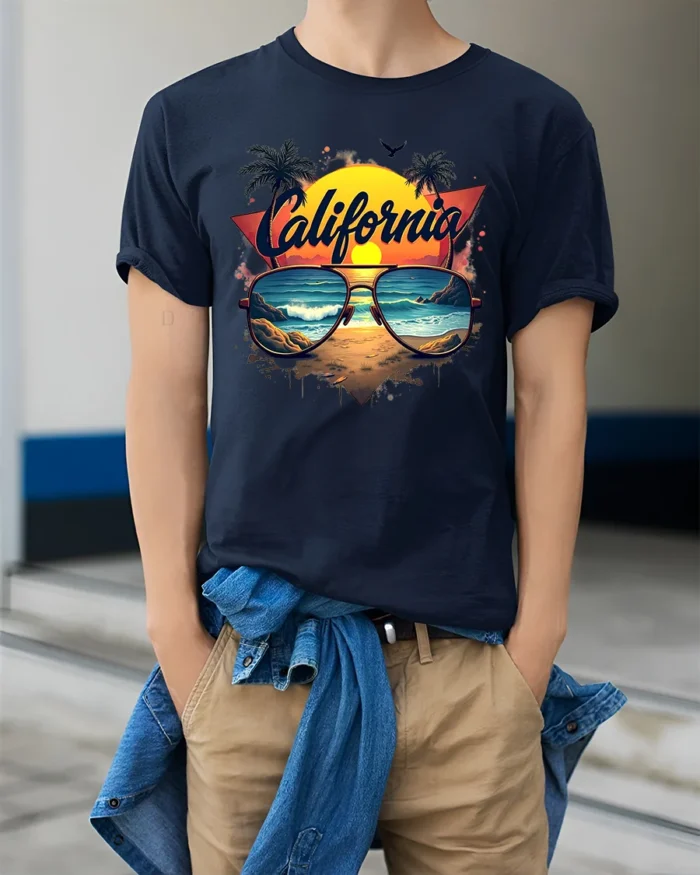 California Beach Vibes Tee Retro Sunset Sunglasses T-Shirt for West Coast Fans - model wearing navy shirt, hands in pockets