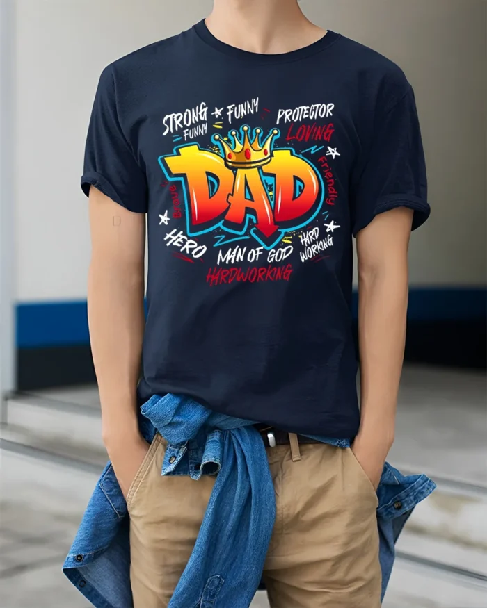 King Dad Attributes Tee Strong Loving Father’s Day T-Shirt Gift for Papa - model wearing navy shirt, hands in pockets