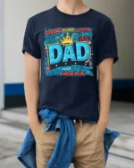 Best Dad Ever Crown Tee Strong Funny Protector Father’s Day T-Shirt for Him - model wearing navy shirt, hands in pockets