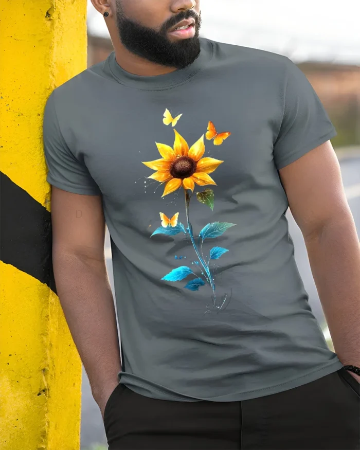 Sunflower Butterfly Tee Vibrant Floral Insect T-Shirt for Nature Lovers - model in grey shirt leaning against column