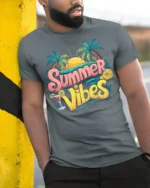 Cool Summer Vibes T-Shirt Retro Beach Sunset Tee with Palm Trees Drink - model in grey shirt leaning against column