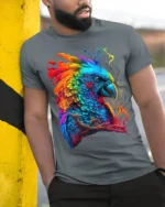 Colorful Parrot Explosion T-Shirt Vibrant Tropical Bird Tee for Summer Fun - model in grey shirt leaning against column