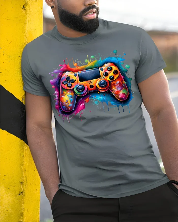 Splash Gamer Tee Vibrant Colorful Controller T-Shirt for Video Game Fans - model in grey shirt leaning against column