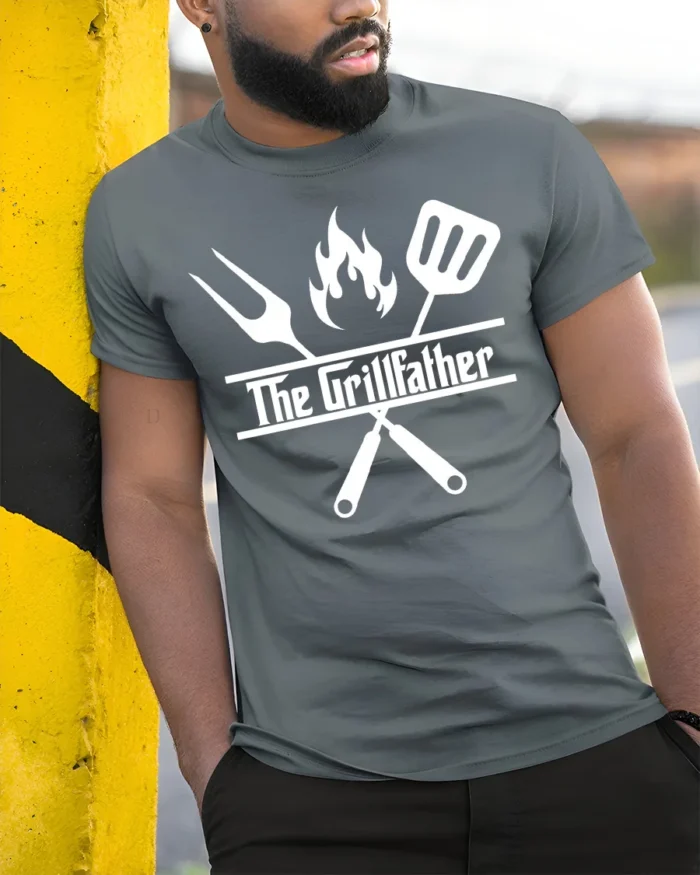 Grilling Godfather T-Shirt Funny BBQ Master Tee for Dad the Grill Boss - model in grey shirt leaning against column