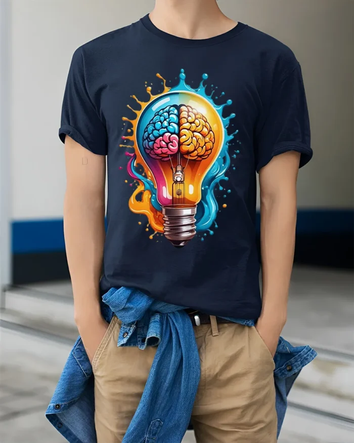 Creative Brain Lightbulb T-Shirt Artistic Mind Power Graphic Tee in Soft Cotton - model wearing navy shirt, hands in pockets