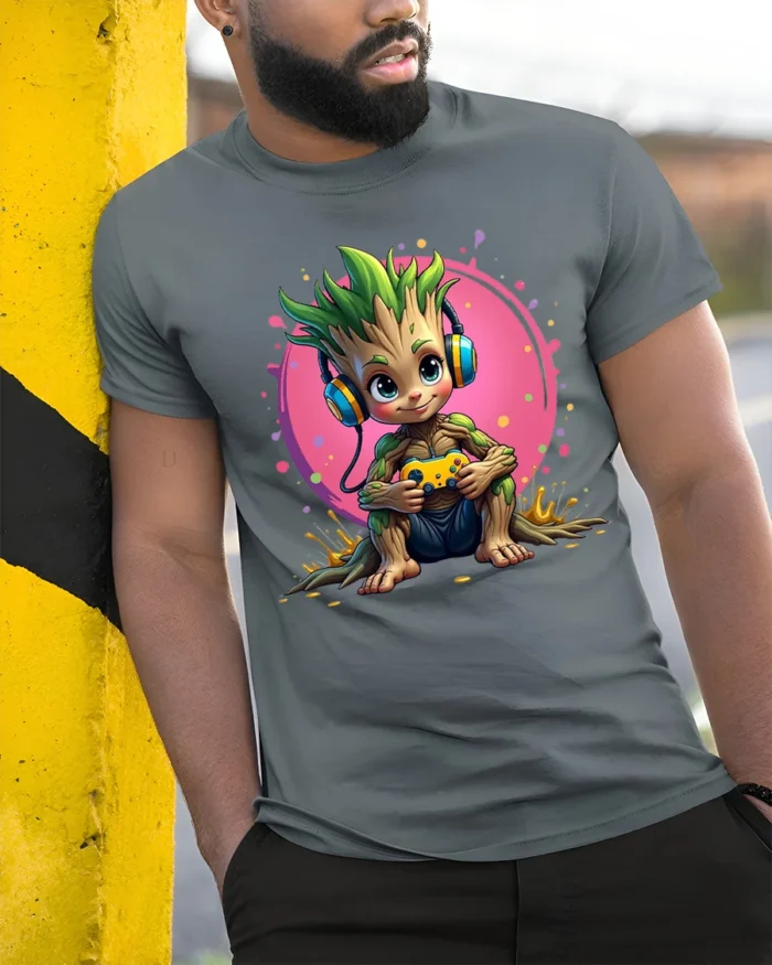 Gaming Tree Sprout T-Shirt - Funny Nerdy Tee with Headphones and Controller - model in grey shirt leaning against column