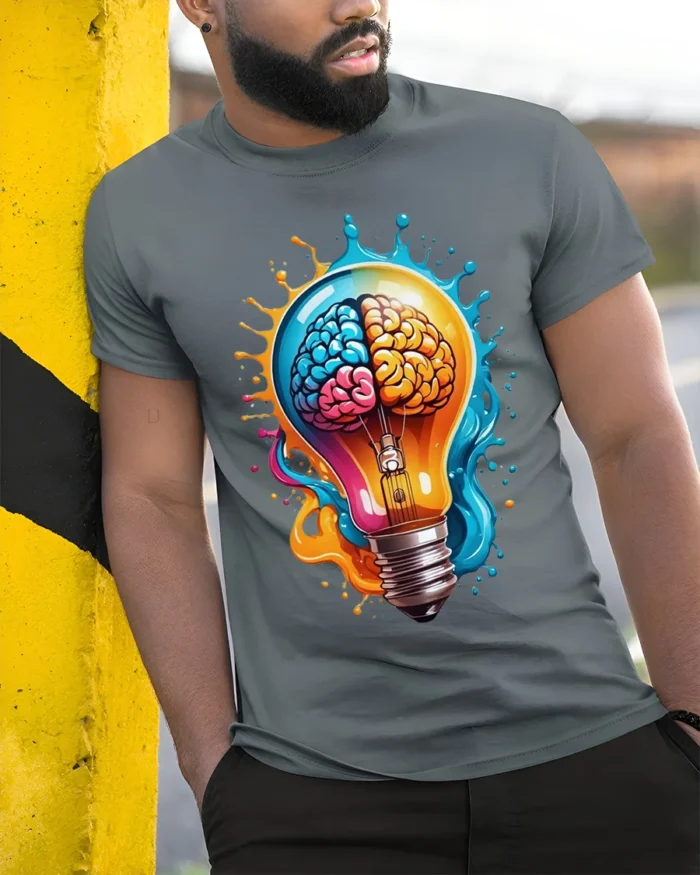 Creative Brain Lightbulb T-Shirt Artistic Mind Power Graphic Tee in Soft Cotton - model in grey shirt leaning against column