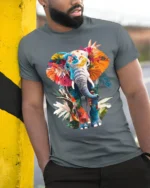 Colorful Elephant T-Shirt with Floral Design Soft Artistic Jungle Tee for Nature Fans - model in grey shirt leaning against column