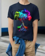 Bold Color Explosion Chakra Tree Of Life Yoga Zen T-Shirt Unique Graphic Tee for Artists and Dreamers - model wearing navy shirt, hands in pockets