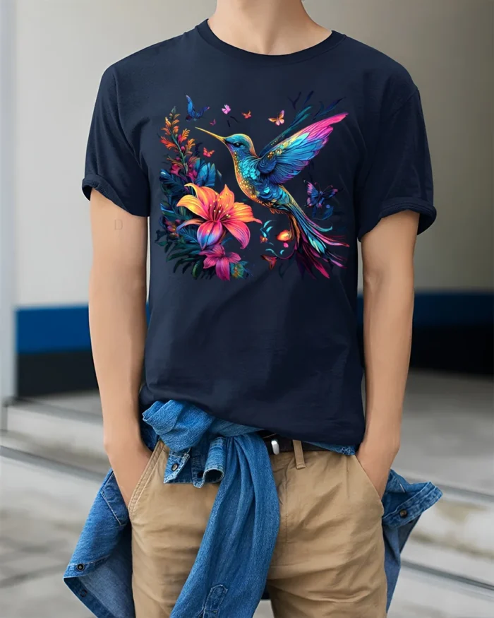 Nature Art Hummingbird T-Shirt Bright Floral Print Tee with Butterflies - model wearing navy shirt, hands in pockets