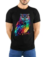 Rainbow Owl T-Shirt Striking Colorful Bird Tee for Animal Art Enthusiasts - model wearing black shirt, hands behind back