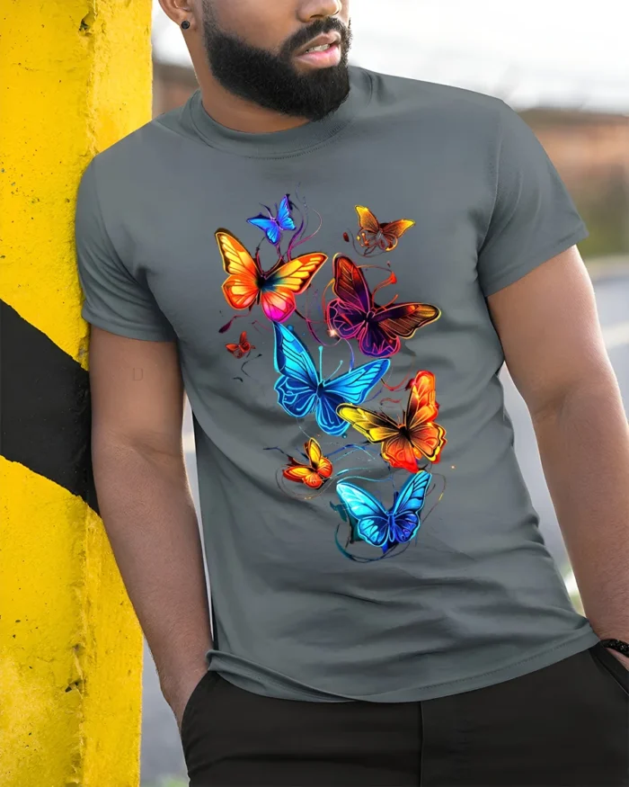Vivid Rainbow Butterfly T-Shirt Colorful Glow Insect Tee for Nature Lovers - model in grey shirt leaning against column