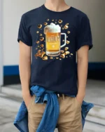 Happy Father’s Day Beer T-Shirt Funny Gift Tee with Mug and Golden Hearts Print - model wearing navy shirt, hands in pockets