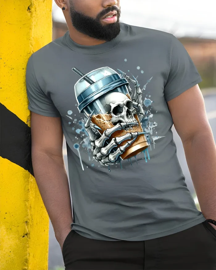 Skeleton Iced Coffee T-Shirt Bold Gothic Style Tee for Caffeine and Skull Lovers - model in grey shirt leaning against column