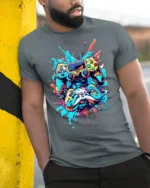 Colorful Gaming Controller T-Shirt Cool Gamer Graphic Tee for Console Fans - model in grey shirt leaning against column