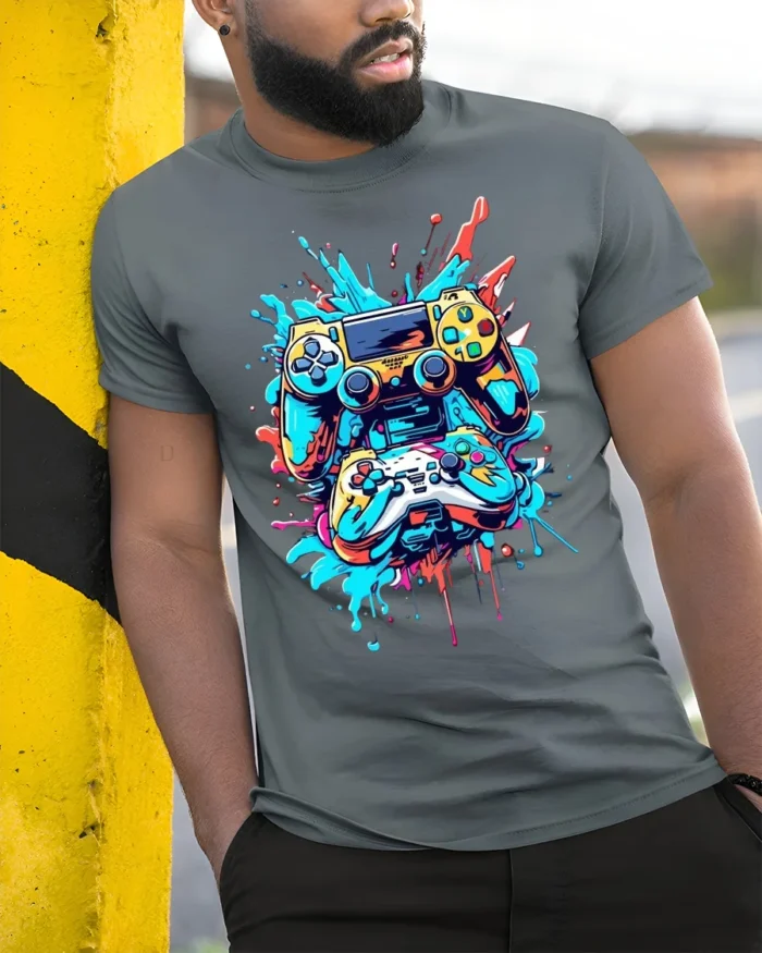 Colorful Gaming Controller T-Shirt Cool Gamer Graphic Tee for Console Fans - model in grey shirt leaning against column