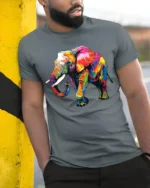 Psychedelic Elephant T-Shirt Bright Safari Graphic Tee for Elephant Lovers - model in grey shirt leaning against column