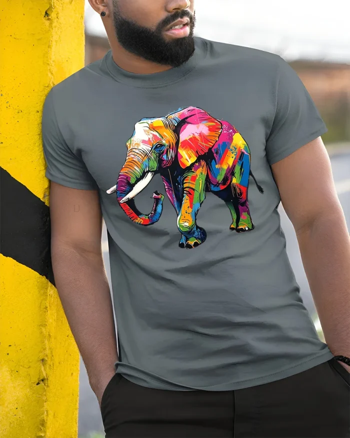 Psychedelic Elephant T-Shirt Bright Safari Graphic Tee for Elephant Lovers - model in grey shirt leaning against column