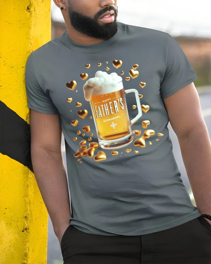 Happy Father’s Day Beer T-Shirt Funny Gift Tee with Mug and Golden Hearts Print - model in grey shirt leaning against column