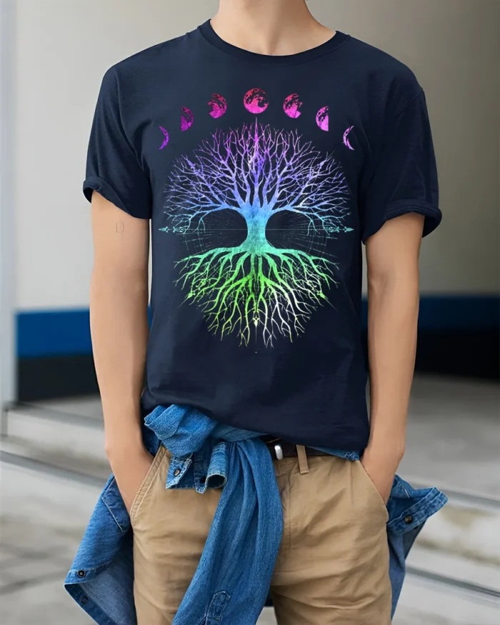 Celestial Chakra Tree - Gradient Moon Phases Tree of Life Yoga Zen T-Shirt - model wearing navy shirt, hands in pockets