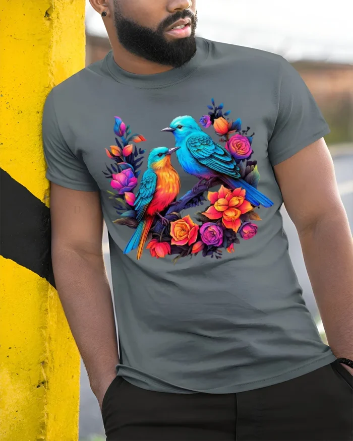 Garden Birds Serenade Vibrant Flowers Bird T-Shirt for Bird Watchers - model in grey shirt leaning against column