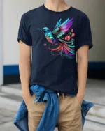 Vibrant Rainbow Hummingbird T-Shirt  Artistic Floral Bird Tee for Nature Fans - model wearing navy shirt, hands in pockets