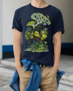 Enchanted Jungle T-Shirt Fantasy Plant Graphic Tee for Nature Lovers - model wearing navy shirt, hands in pockets