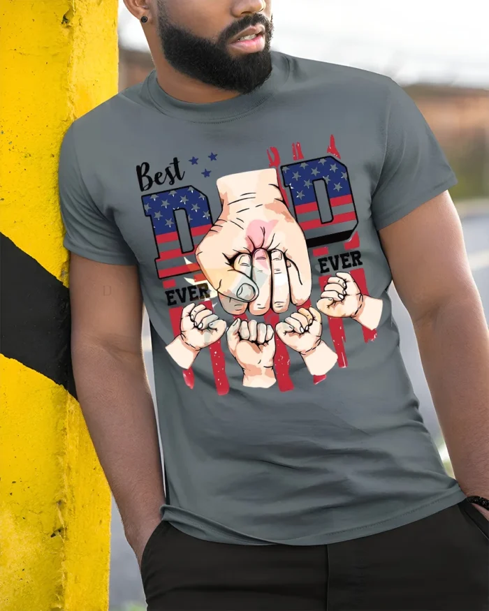 Father’s Day T-Shirt Best Dad Ever Fist Bump Tee with American Flag Design - model in grey shirt leaning against column
