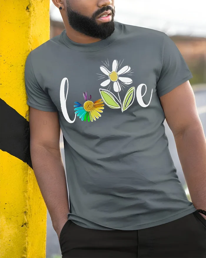Rainbow Flower Love T-Shirt Soft Cotton Inspirational Graphic Tee - model in grey shirt leaning against column