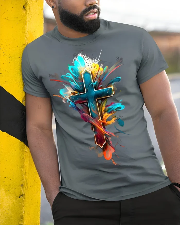 Vibrant Faith Cross Tee Abstract Christian Symbol T-Shirt for Believers - model in grey shirt leaning against column