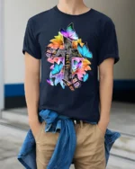 Christian Faith T-Shirt with Cross, Flowers, and Butterflies - model wearing navy shirt, hands in pockets
