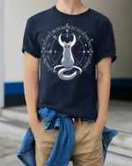 Mystic Cat Moon T-Shirt Celestial Witchcraft Tee - model wearing navy shirt, hands in pockets