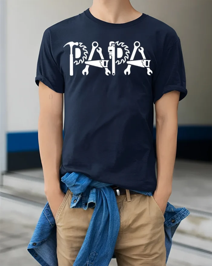 Papa Fix-It T-Shirt Tools Design Gift for Handy Dads - model wearing navy shirt, hands in pockets