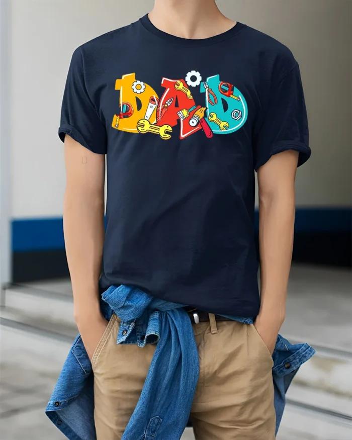 Colorful Dad T-Shirt with Tools Fun Father’s Day Gift Tee - model wearing navy shirt, hands in pockets