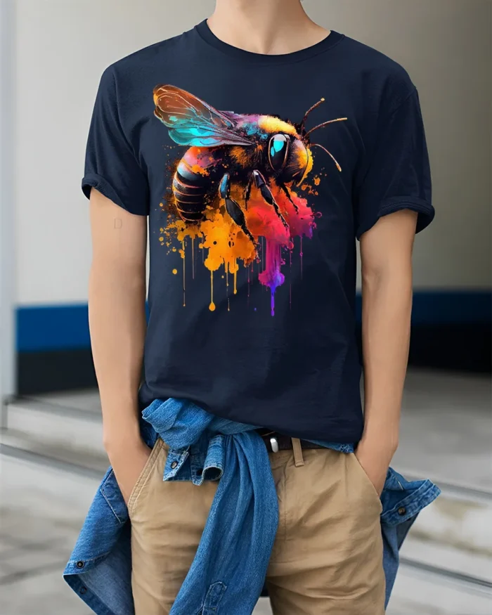 Abstract Bee Graphic T-Shirt Bold Colorful Design - model wearing navy shirt, hands in pockets