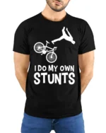 I Do My Own Stunts T-Shirt Funny Bike Fall Graphic Tee - model wearing black shirt, hands behind back