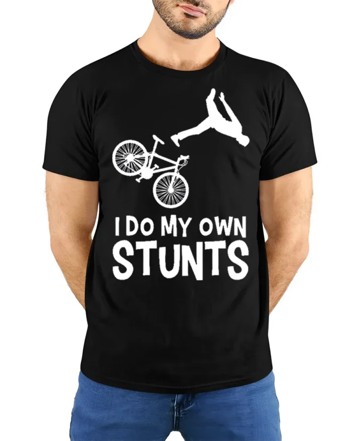 I Do My Own Stunts T-Shirt Funny Bike Fall Graphic Tee - model wearing black shirt, hands behind back
