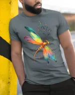Rainbow Dragonfly T-Shirt Colorful Nature Insect Design - model in grey shirt leaning against column