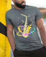 Colorful Saxophone T-Shirt Musical Jazz Notes Graphic Tee - model in grey shirt leaning against column