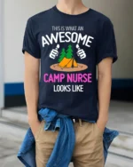Awesome Camp Nurse T-Shirt Funny Outdoor Camping Tee - model wearing navy shirt, hands in pockets