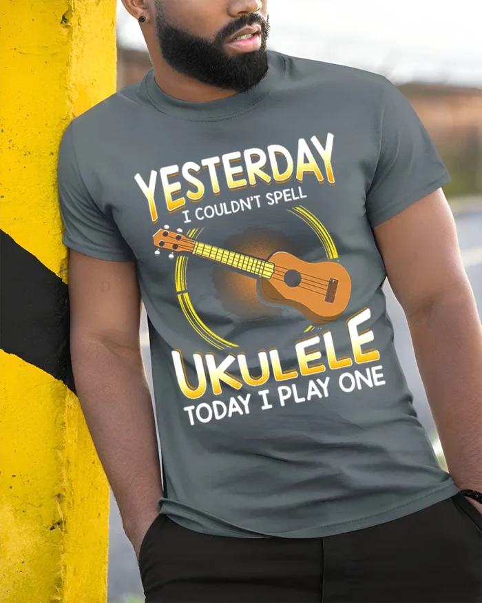 Cool Ukulele Graphic Tee Funny Musician T-Shirt Gift Idea - model in grey shirt leaning against column
