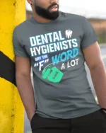 Funny Dental Hygienist T-Shirt Floss Joke Graphic Tee - model in grey shirt leaning against column