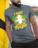 I Hate People T-Shirt - Funny Beach Surfing Graphic Tee - model in grey shirt leaning against column