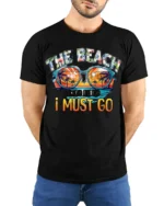 The Beach Is Calling T-Shirt Retro Summer Vacation Tee - model wearing black shirt, hands behind back