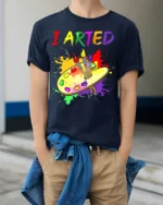 Artistic Humor T-Shirt I ARTED Paint Palette Shirt - model wearing navy shirt, hands in pockets