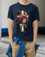 Floral Cross T-Shirt Artistic Faith Design on Soft Tee - model wearing navy shirt, hands in pockets